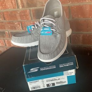 Gray Sketchers ON THE GO Women size 9 shoes.  New in the box.